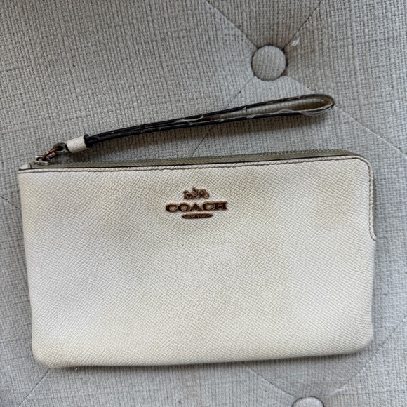 Coach Handbags - Coach Cream Leather Wristlet with Gold Logo and Dark Trim